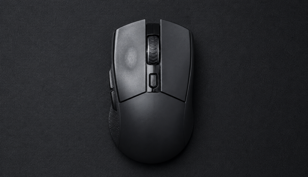 Top-down gaming mouse left button showing click wear from high CPS use