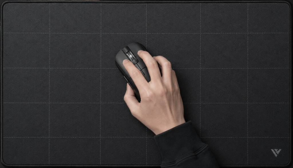 Top-down view of a hand performing a flick aim on a mousepad